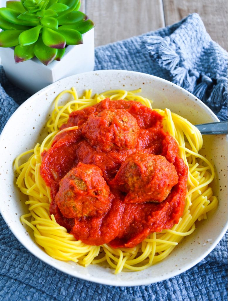 spaghetti and meatballs on a plate