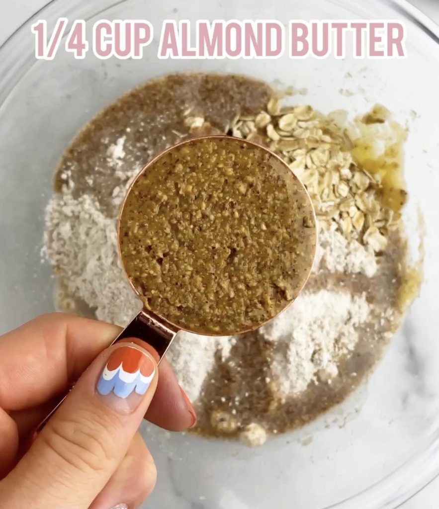 almond butter in a measuring cup