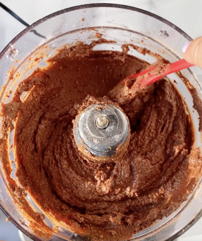 mixing brownie batter in a food processor