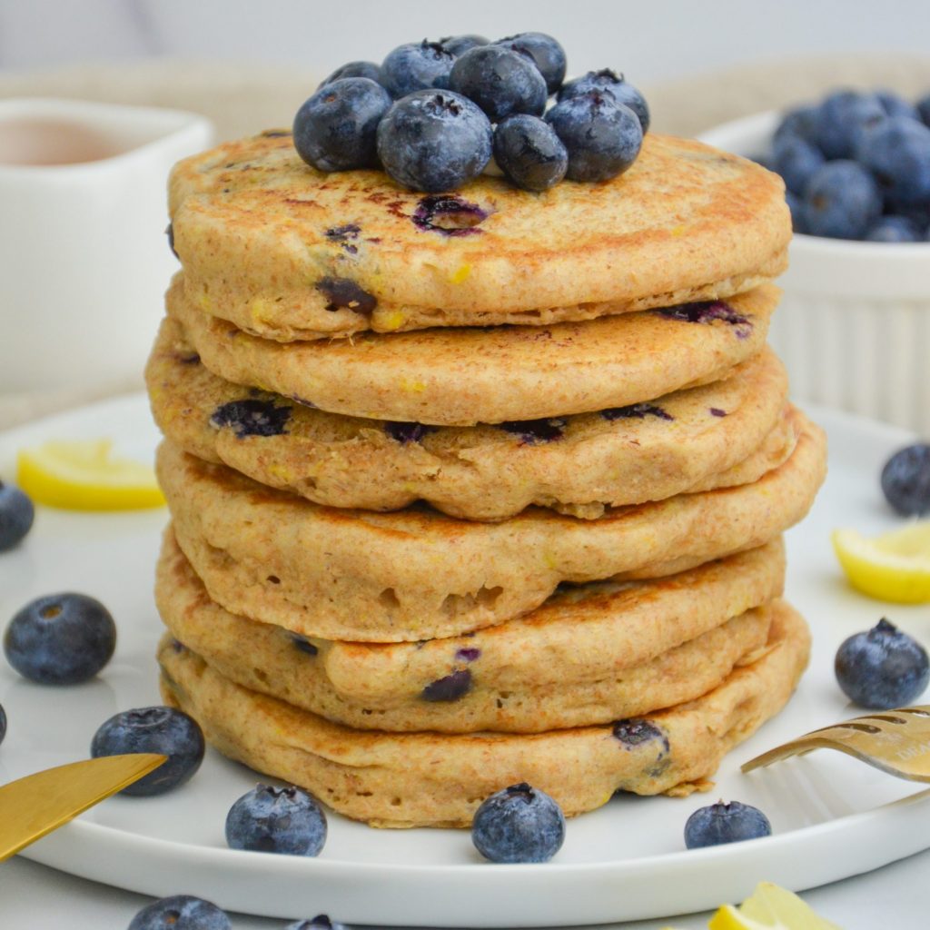 blueberry pancakes stacked on a plate