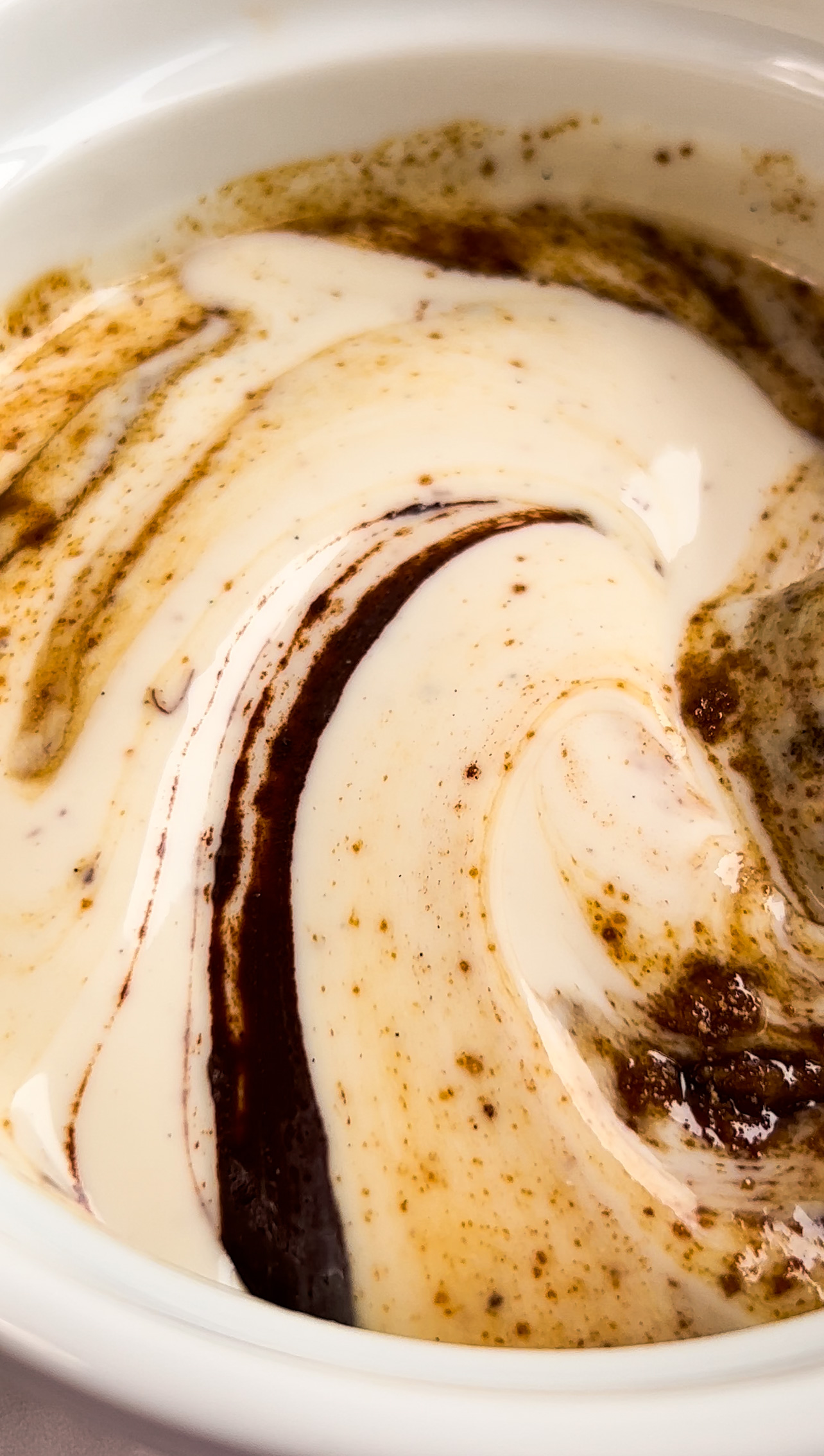 closeup of a bowl with yogurt and chocolate