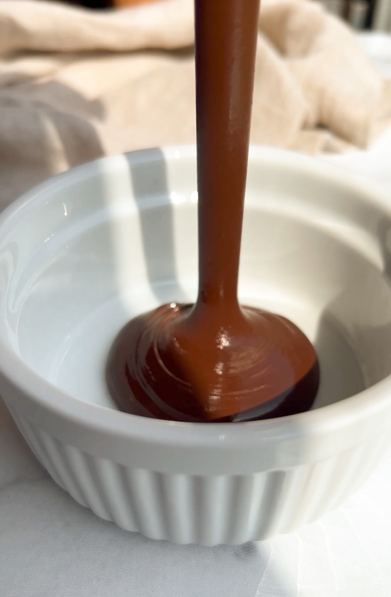 melted chocolate poured into a bowl