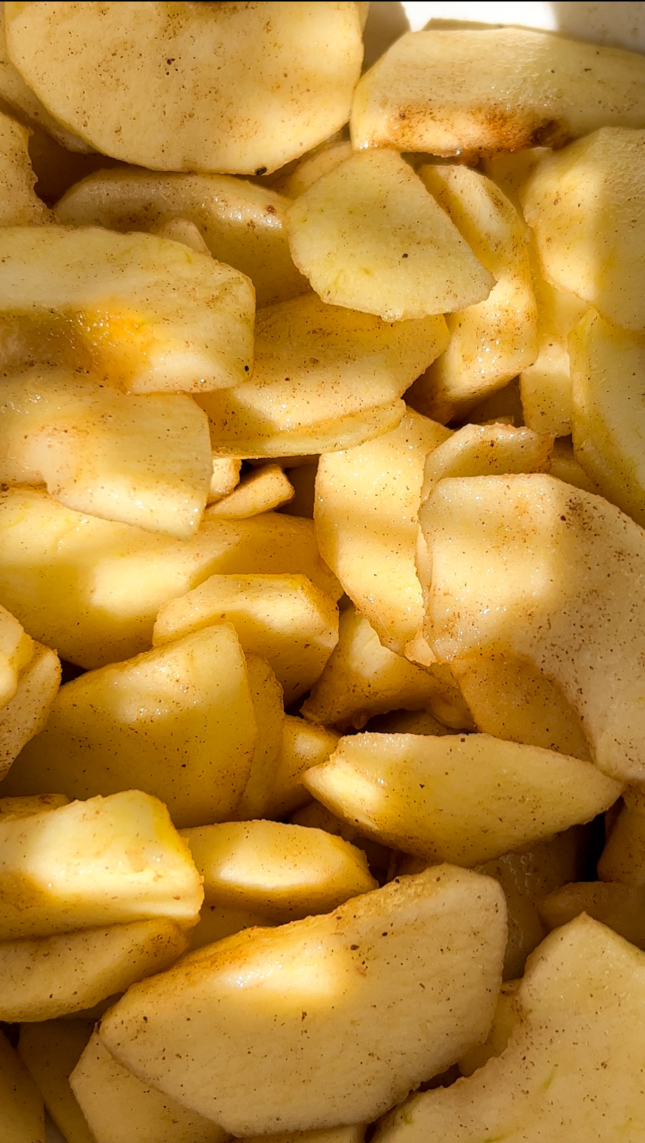 closeup of apple slices prepared for apple filling