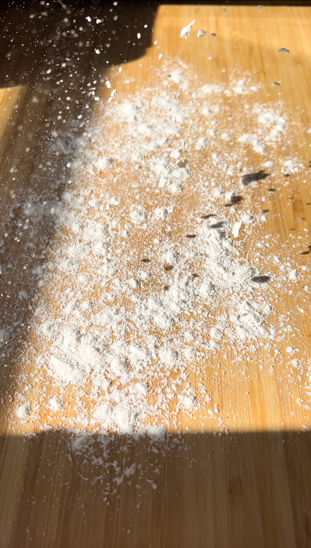 dusting flour on a surface