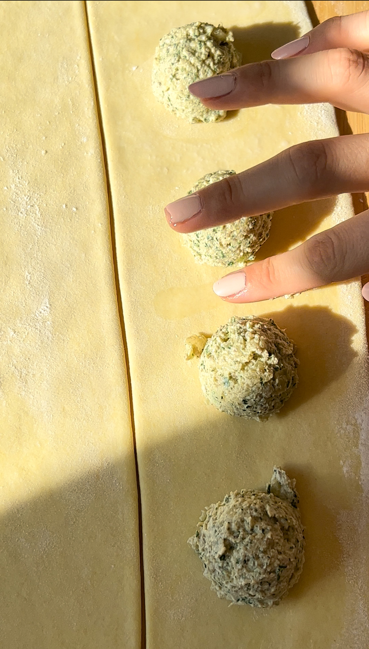 sealing ravioli with a little bit of water