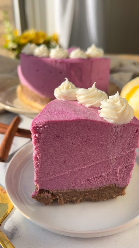 slice of ube cheesecake on a plate