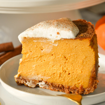 side view of a slice of vegan pumpkin cheesecake