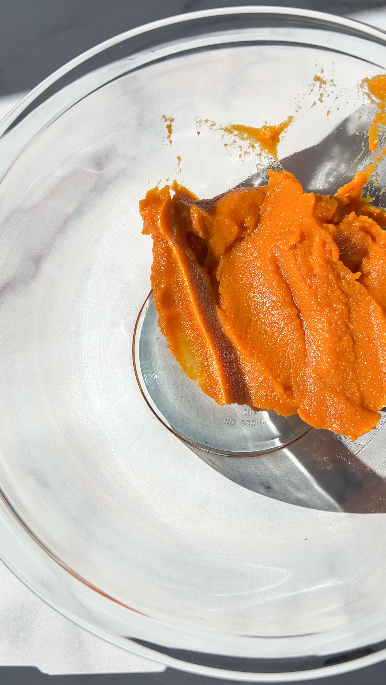pumpkin puree in a large glass bowl