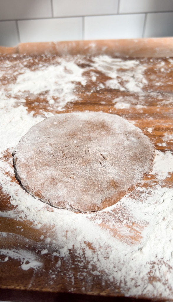 mochi dough round on a cutting board