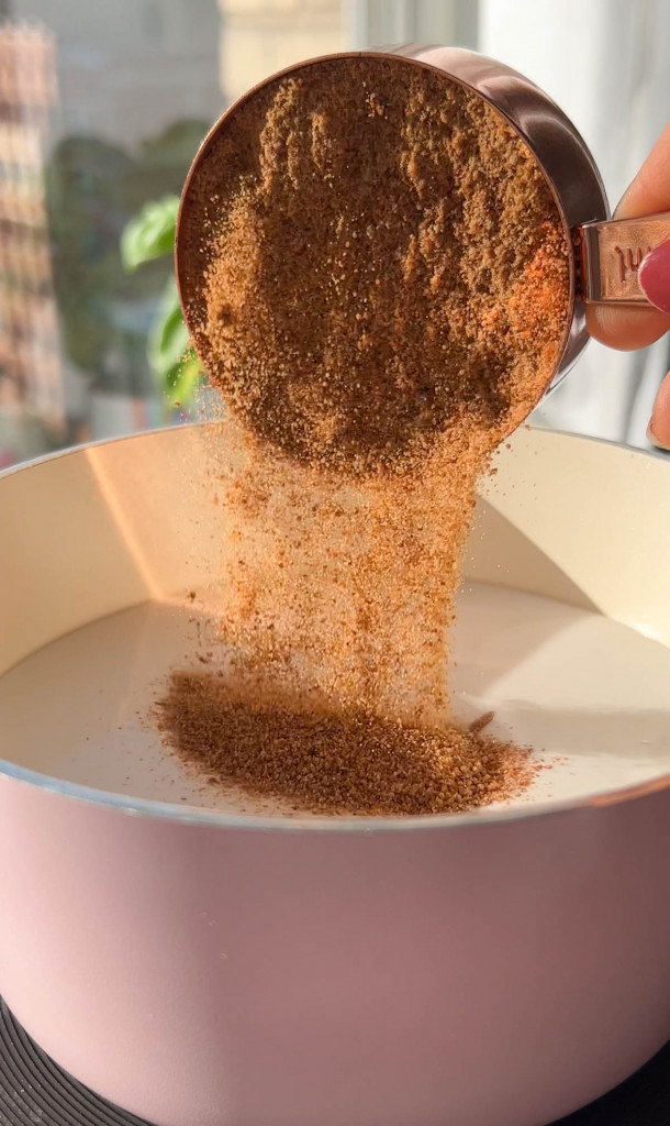 adding coconut sugar to a saucepan