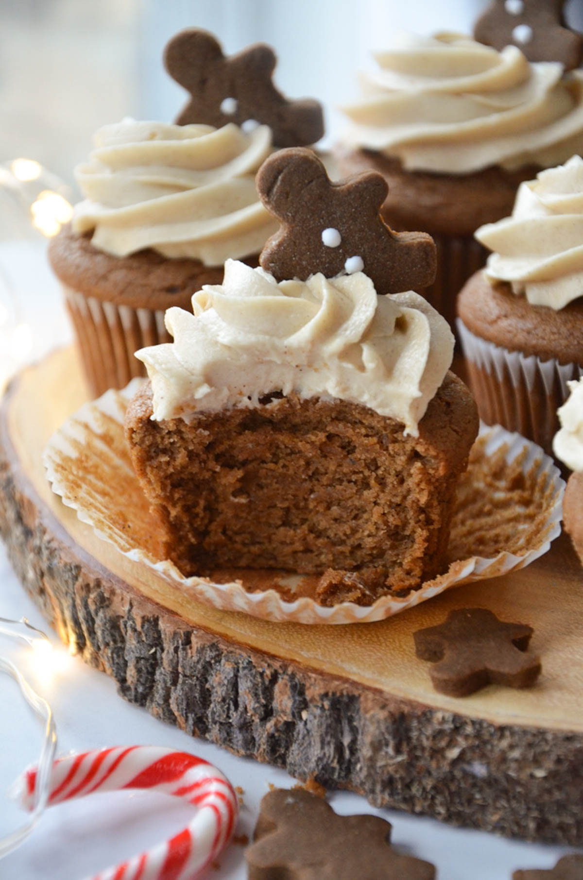 a gingerbread cupcake with a bite into it