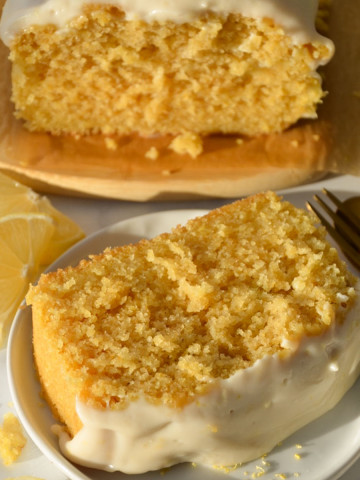 closeup shot of a slice of vegan copycat starbucks lemon loaf on a plate