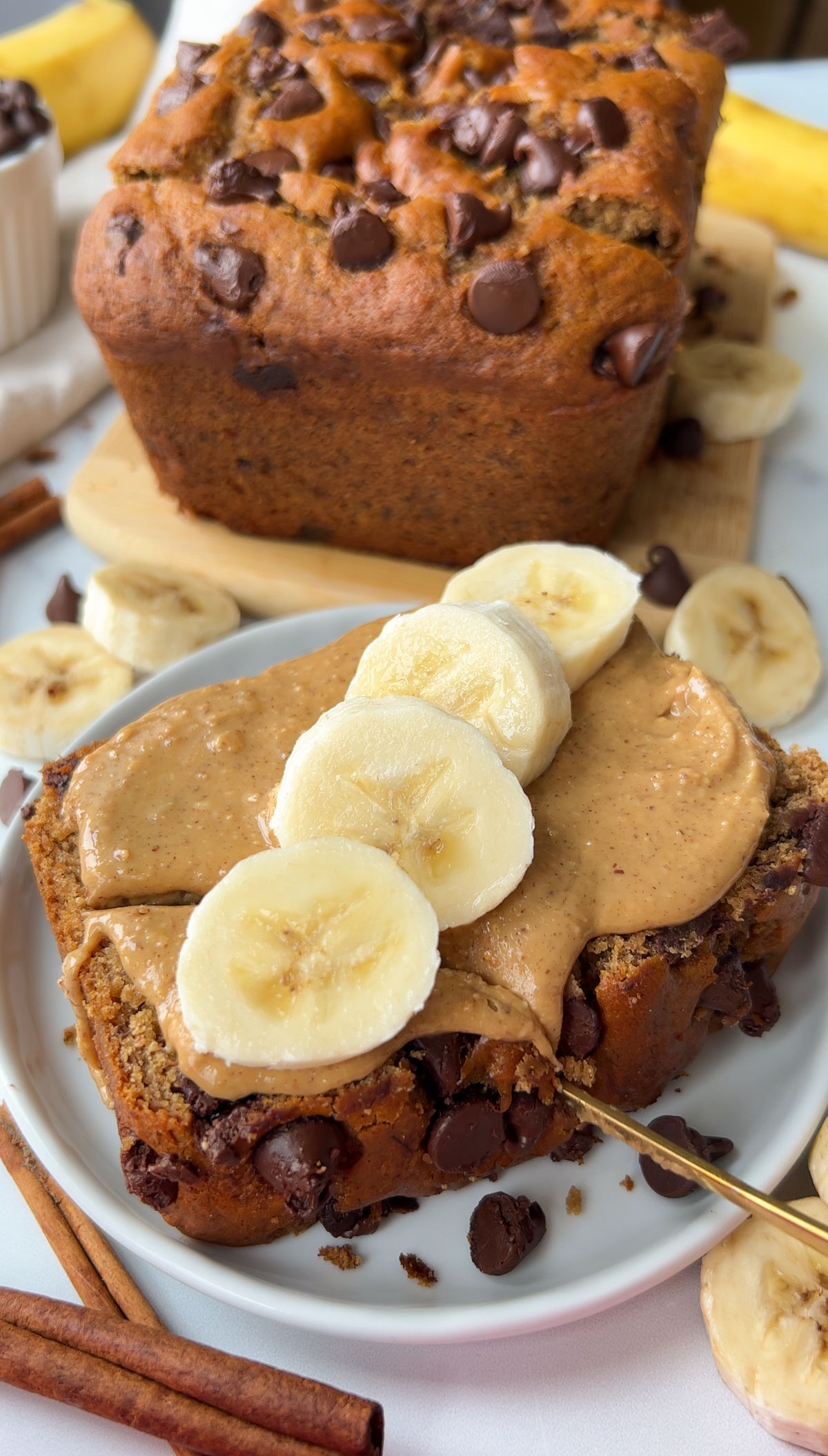 chocolate chip banana bread with peanut butter and banana slices on top
