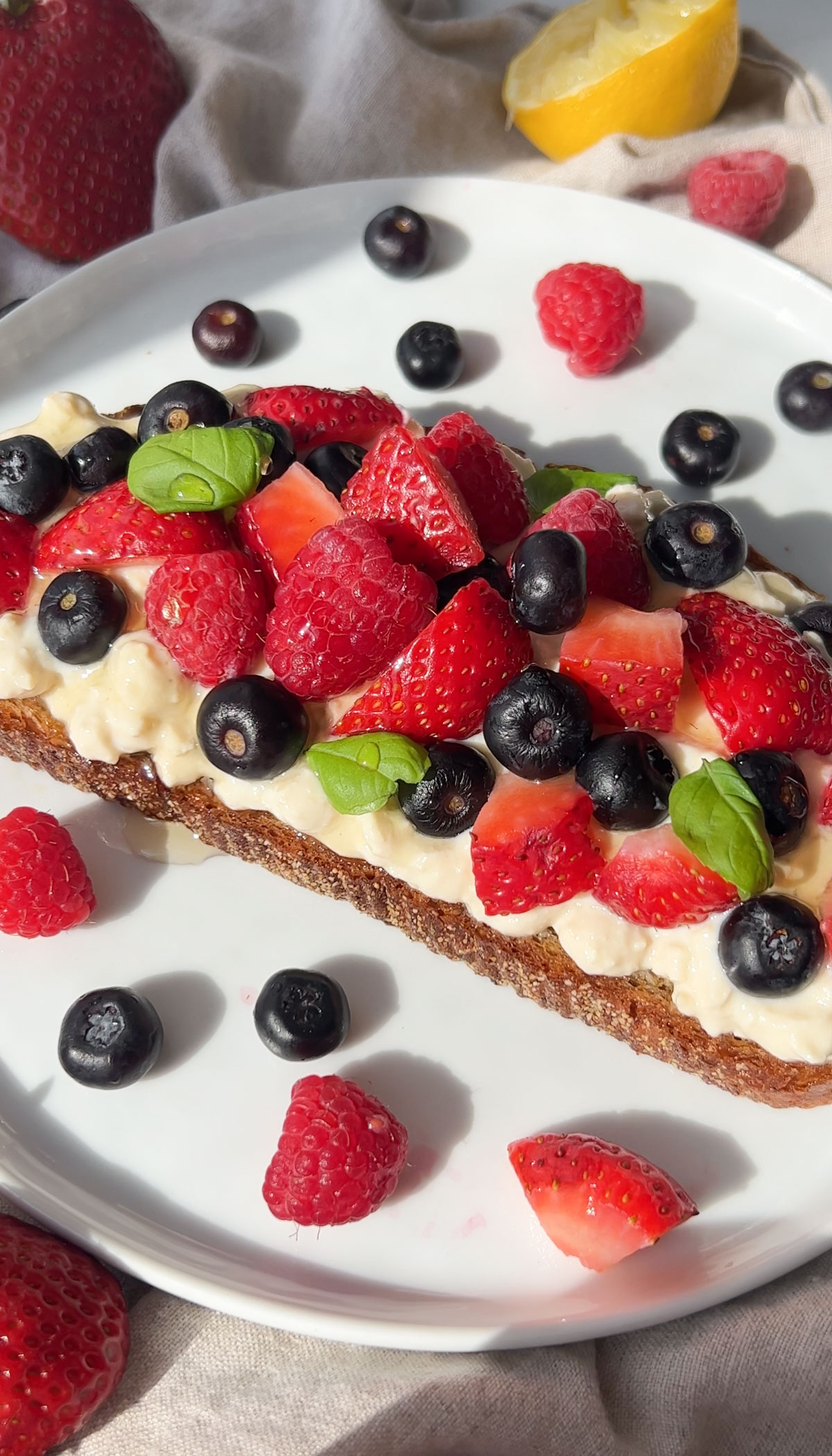 vegan cottage cheese and berries on a slice of toast