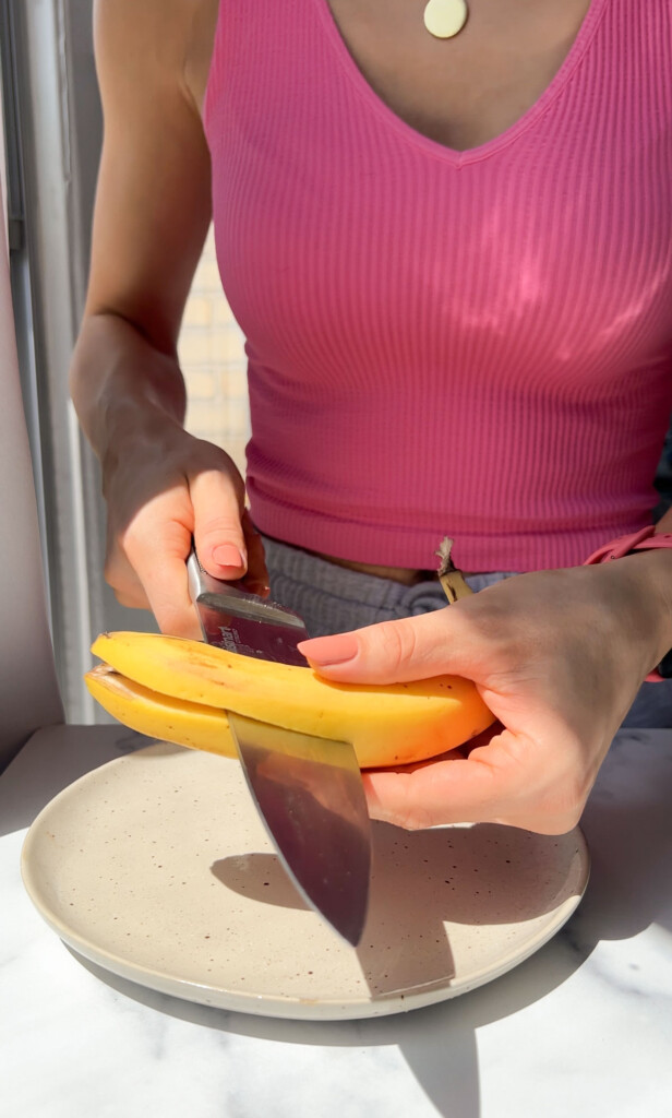 cutting a banana in half