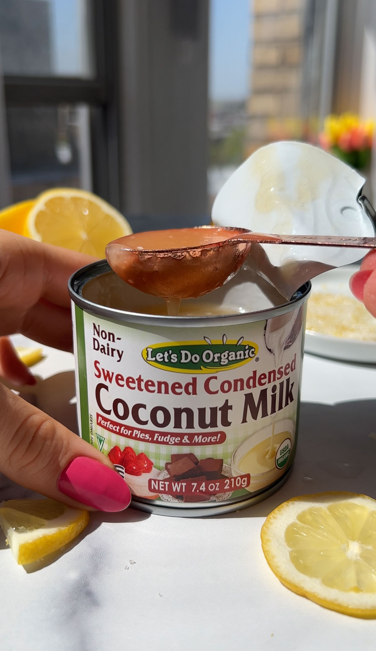 Scooping out the condensed coconut milk.