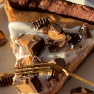 A slice of vegan peanut butter pie on a plate.