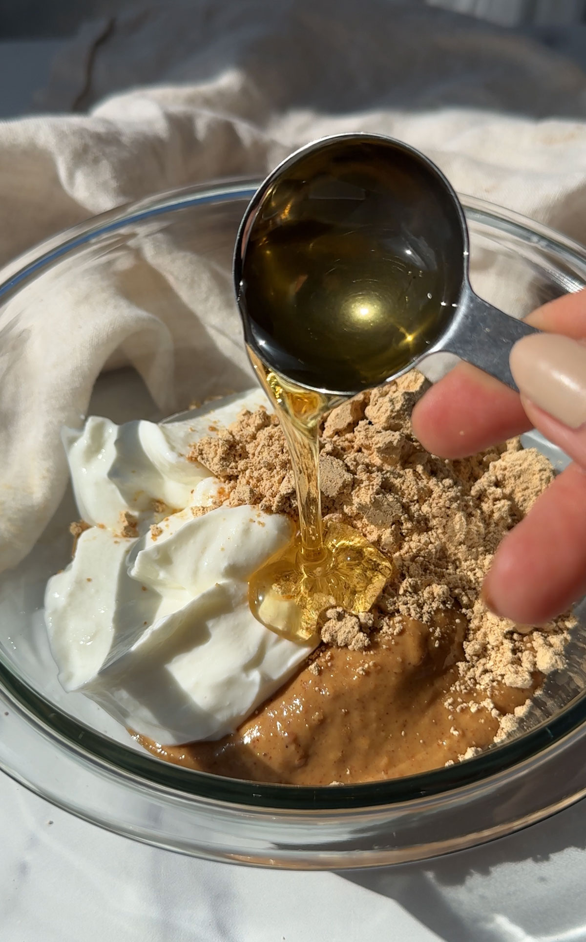 Ingredients for making this peanut butter pie in a mixing bowl.