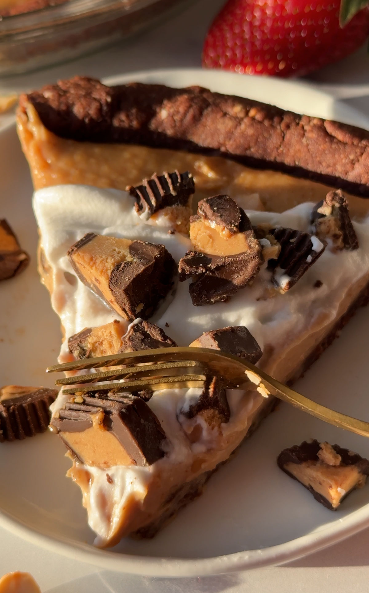 A slice of vegan peanut butter pie on a plate.