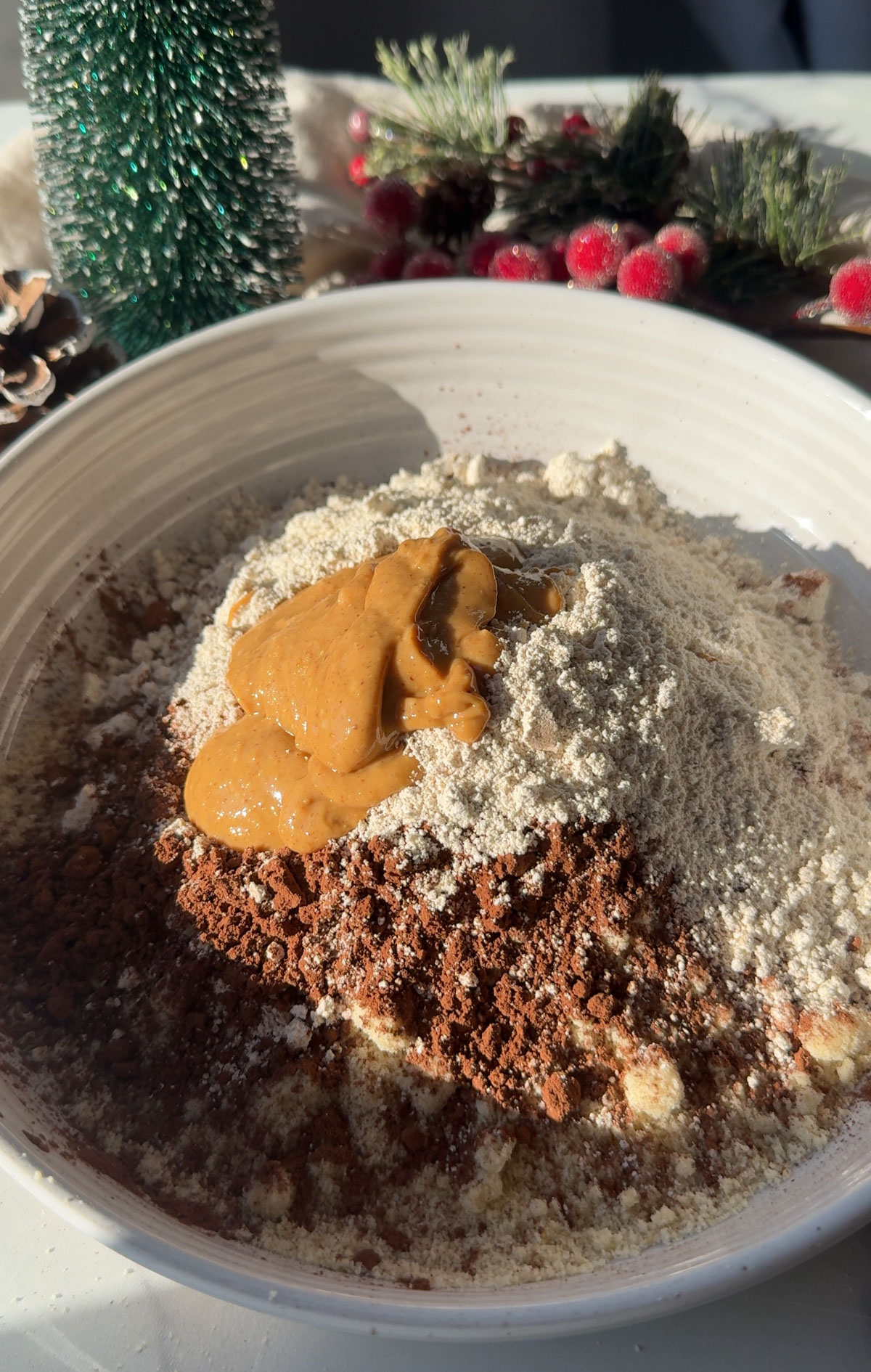 Ingredients for making a yule log in a mixing bowl.