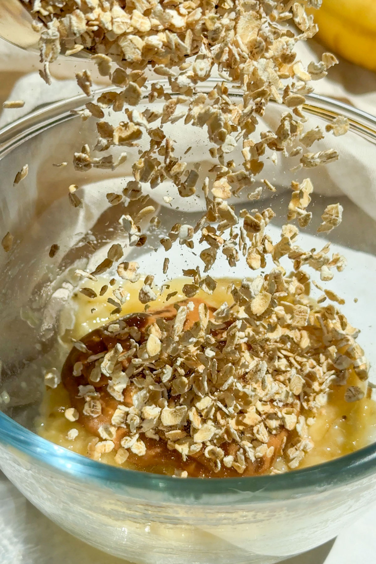 Ingredients for making frozen yogurt cups mixed in a bowl.