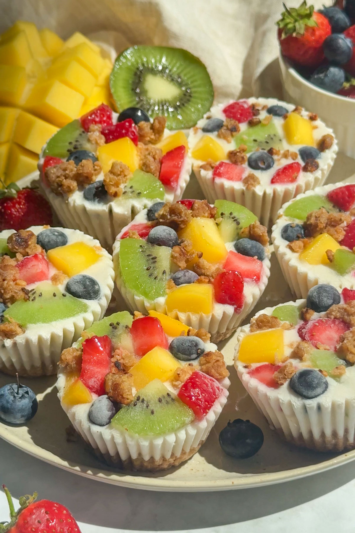 A plate full of frozen yogurt cups.