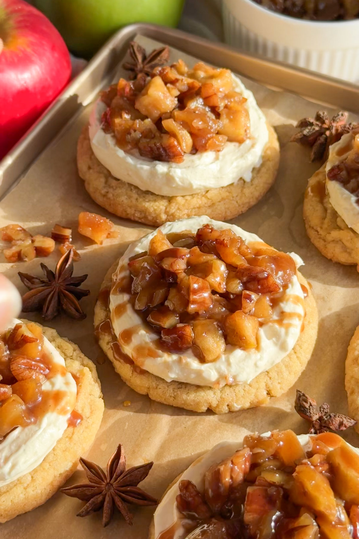 A sheet tray with apple cheesecake cookies.
