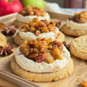 Apple cheesecake cookies on a baking sheet.