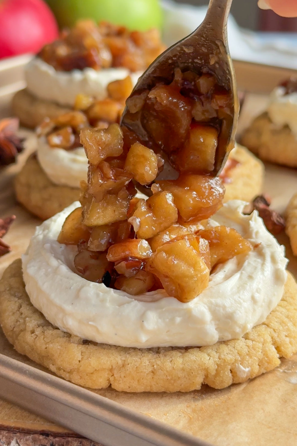 The apple topping added to the cookie.