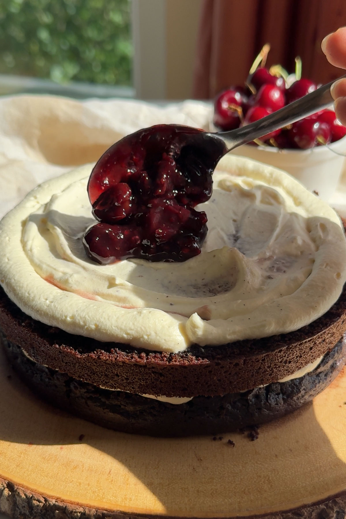 Layering the black forest cake.
