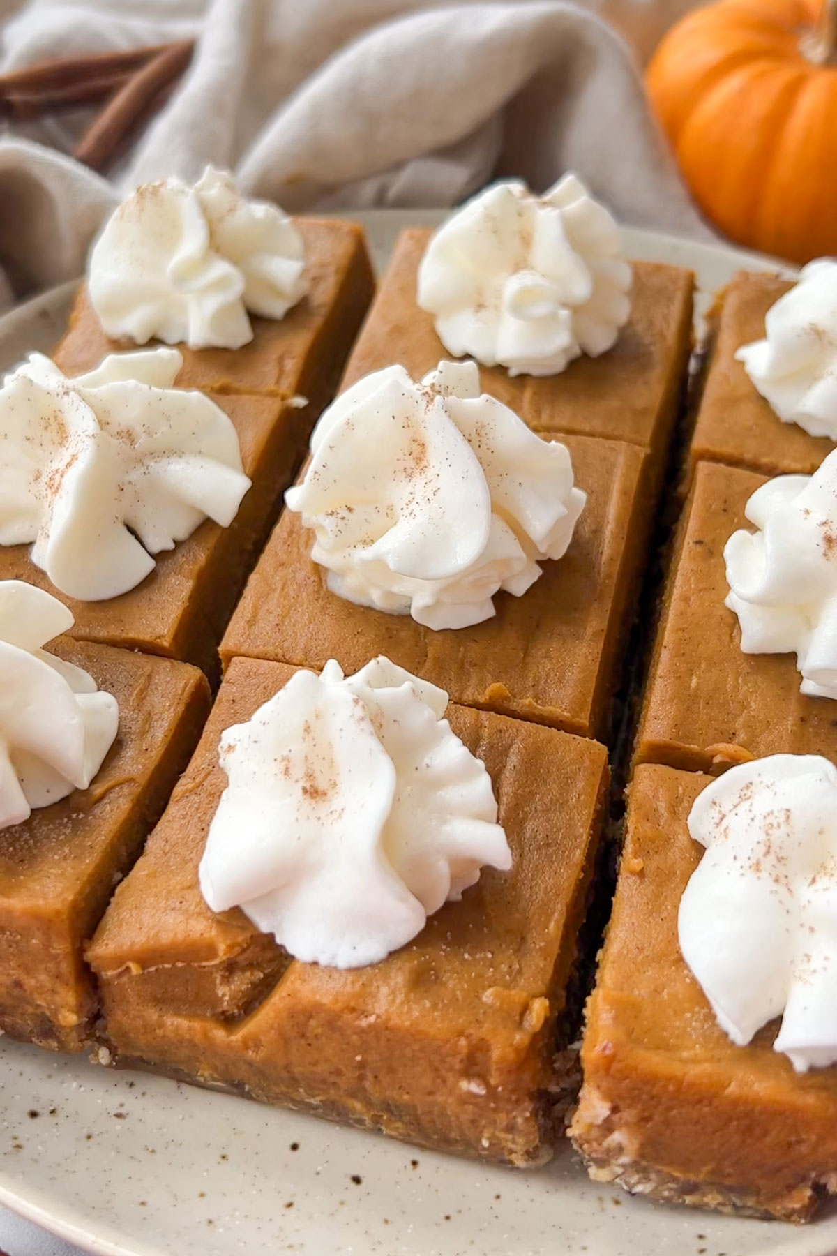 Vegan pumpkin bars cut into squares.