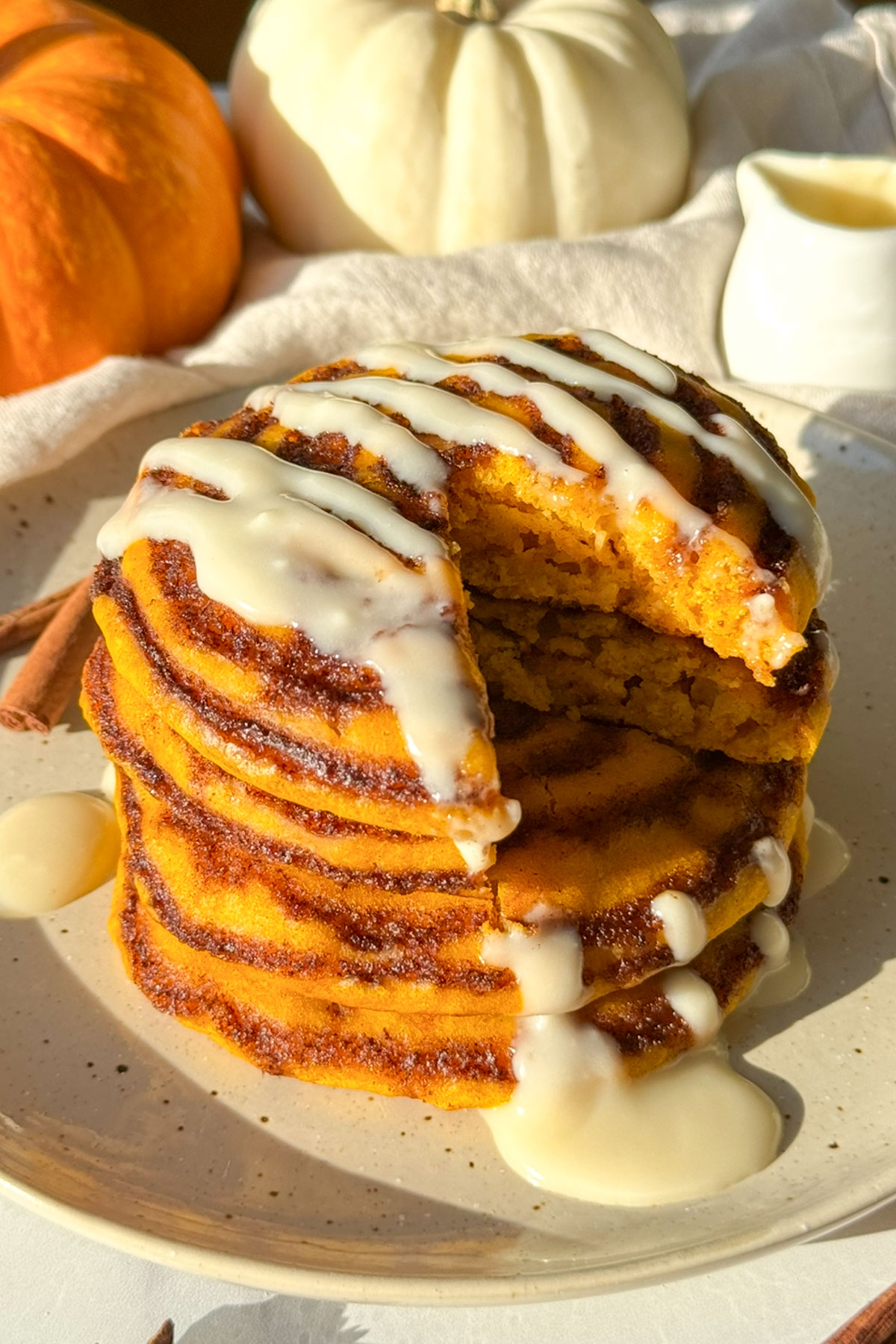 A slice take out of the cinnamon roll pancakes.