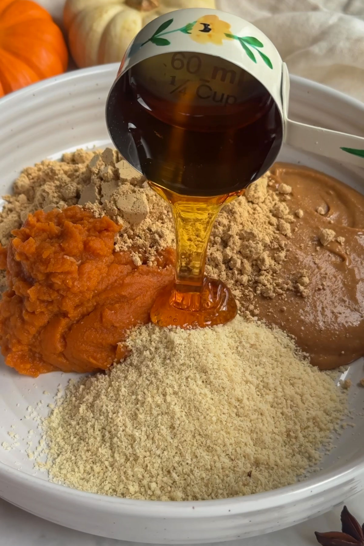 All the ingredients to a mixing bowl.