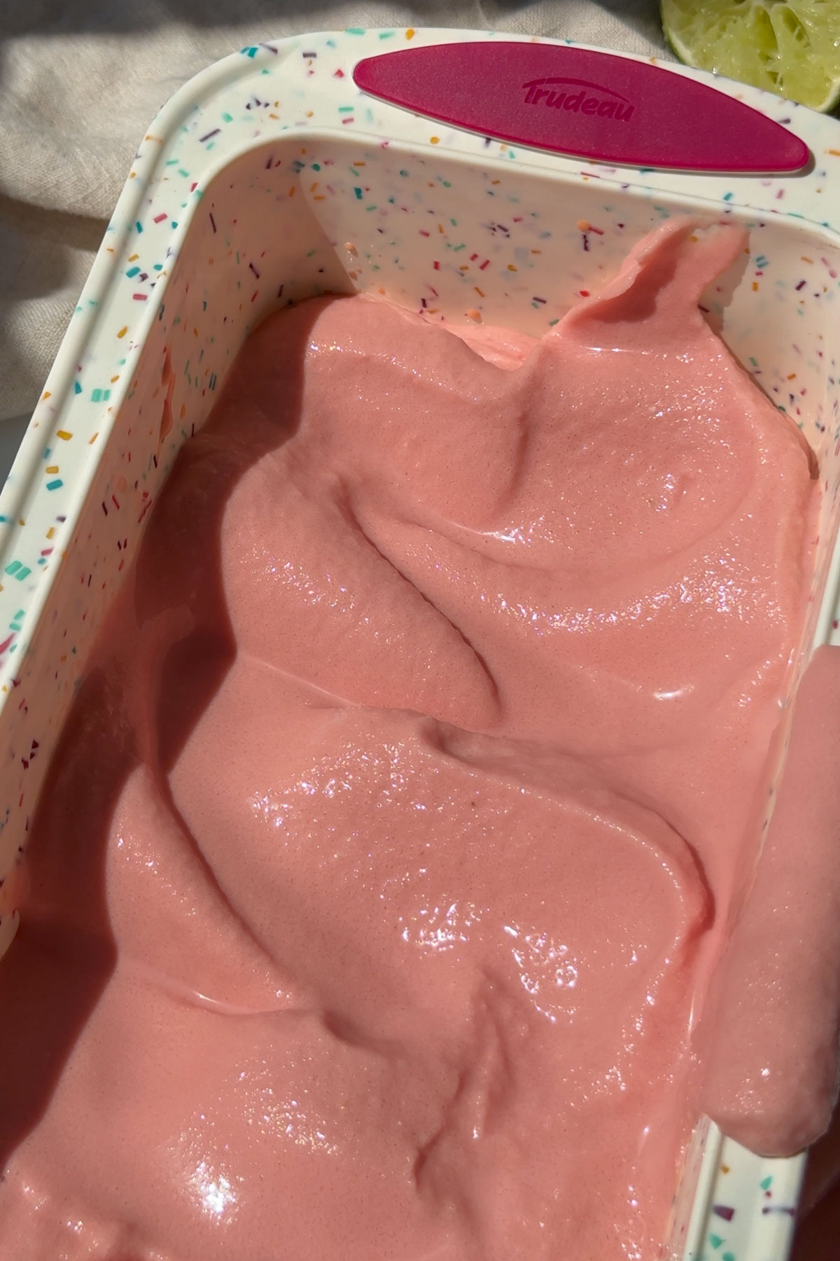 The sorbet in a container.