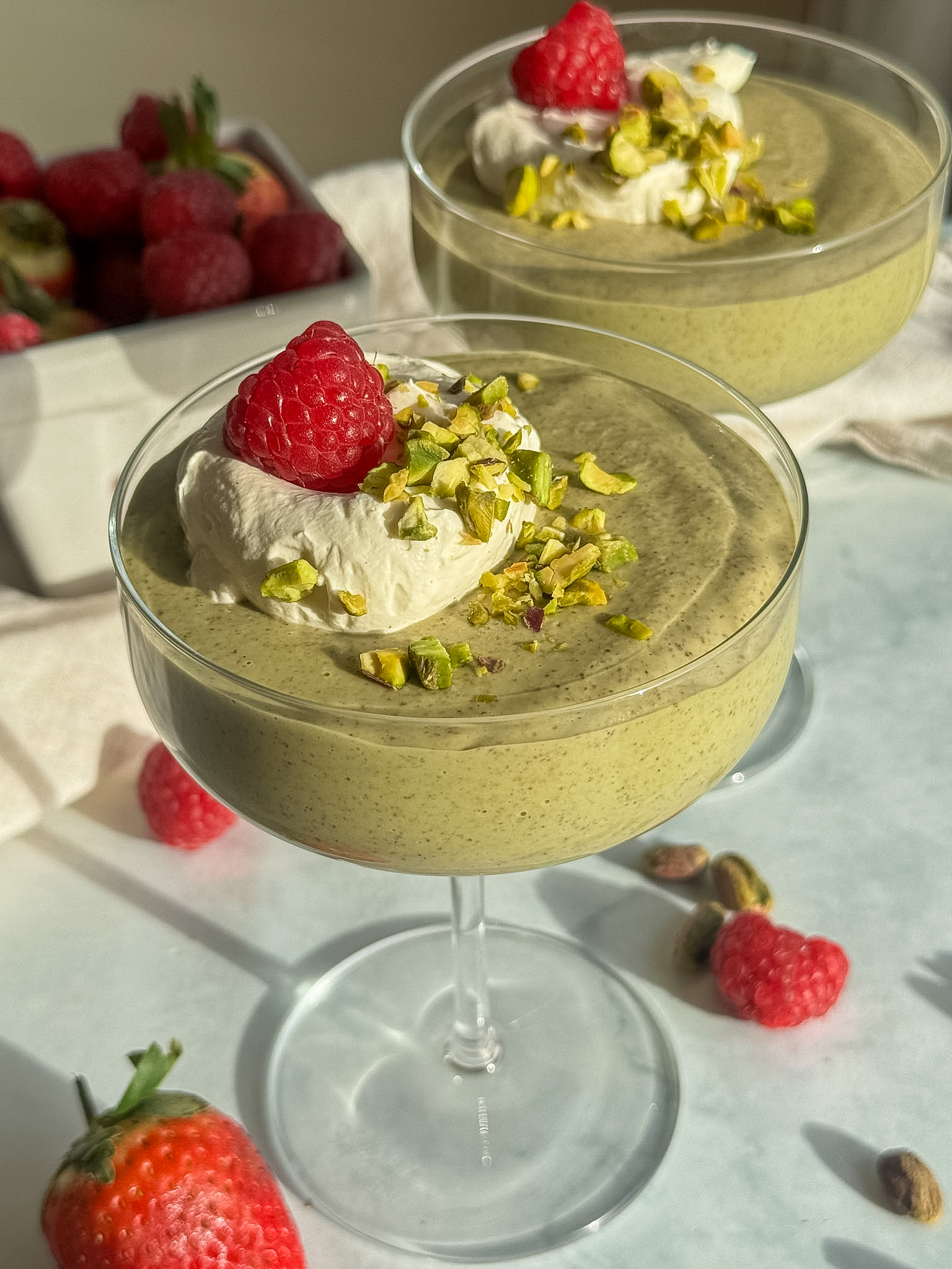 Chia pudding with pistachio in and on top.
